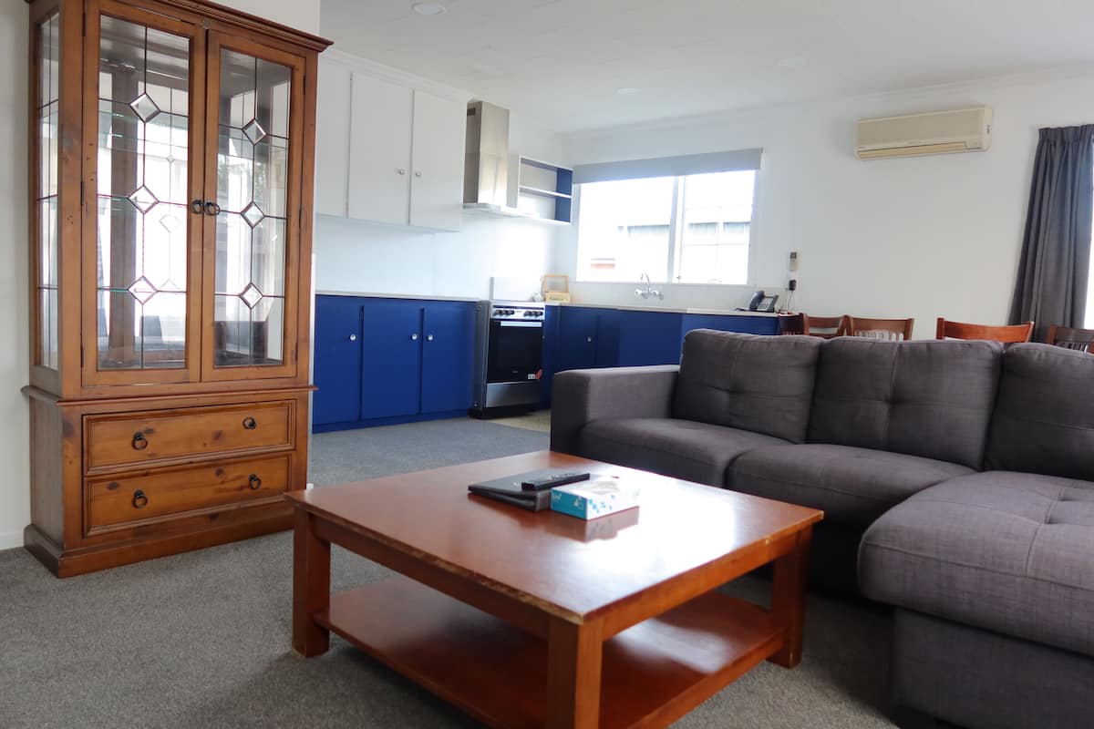 Deluxe Apartment, 2 Bedrooms | Living area | TV