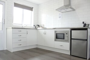 Apartamento superior, 2 habitaciones | 1 dormitorio, wifi gratis, ropa de cama