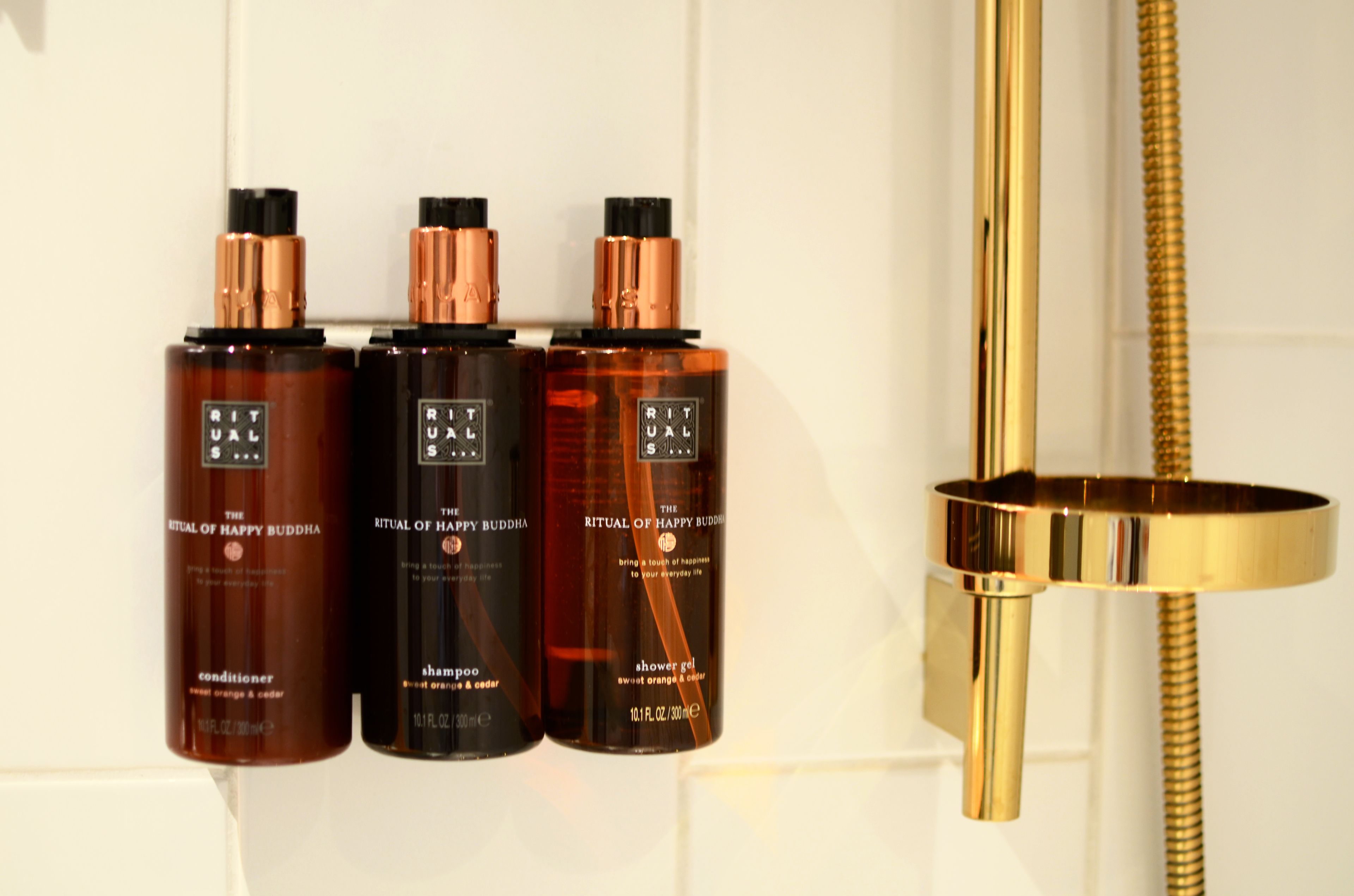 shower, designer toiletries, hair dryer, towels