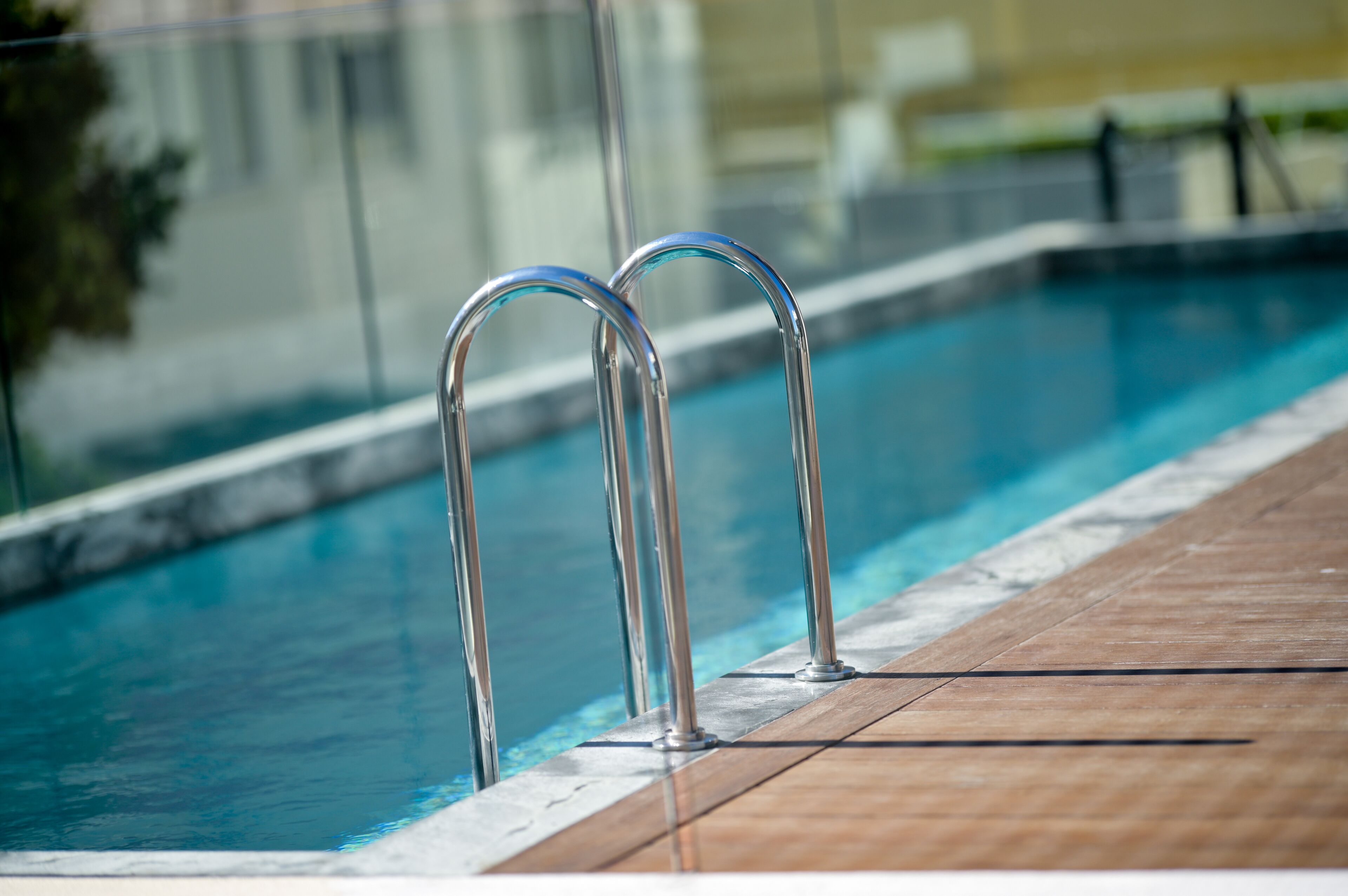 outdoor pool, pool umbrellas, pool loungers