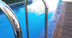 Outdoor pool, pool umbrellas, pool loungers