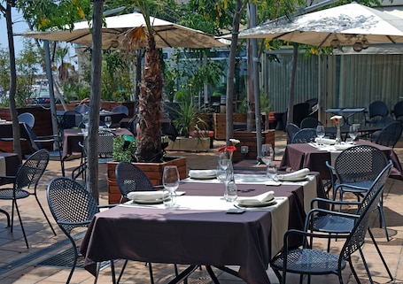 Outdoor dining. Hotel Port Sitges