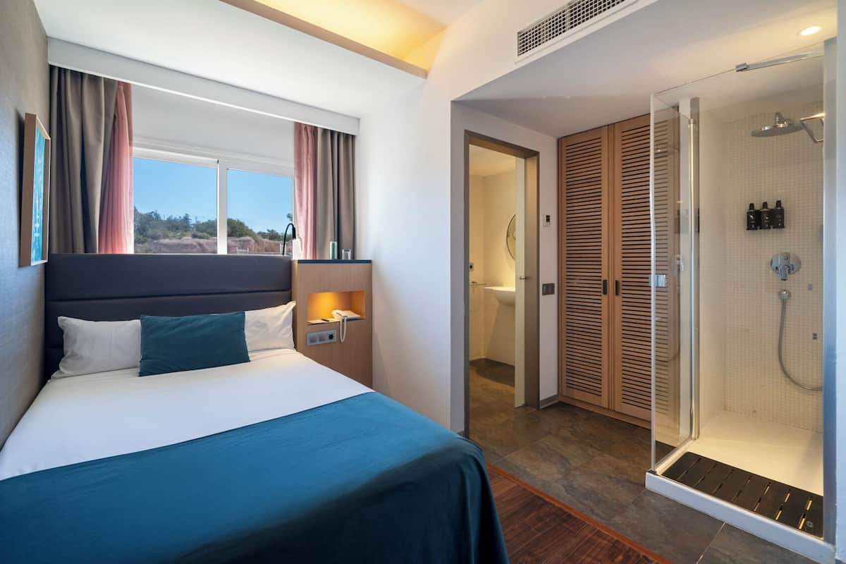 Habitación individual Deluxe | 1 habitación, ropa de cama de alta calidad y minibar