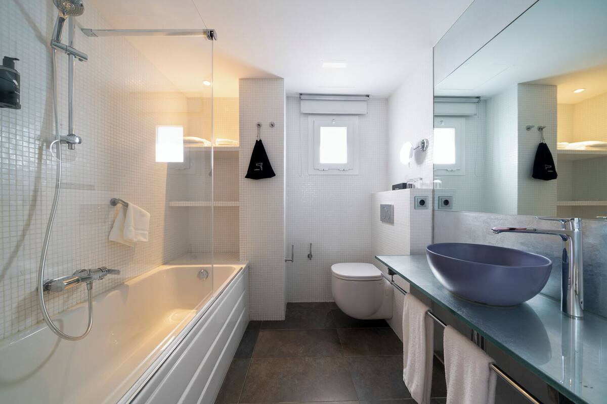 suite, partial sea view (formentera) | bathroom | designer toiletries, hair dryer, slippers, towels