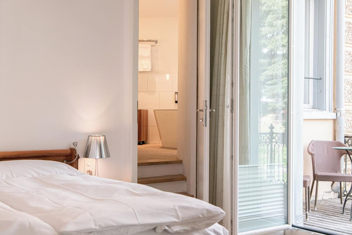 junior suite with south view | 1 bedroom, premium bedding, free minibar, in-room safe