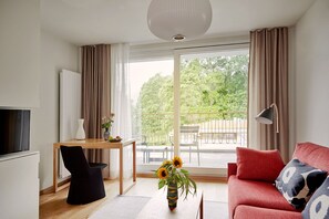 Junior Suite Southwest (Privilege) | Wohnbereich | Fernseher