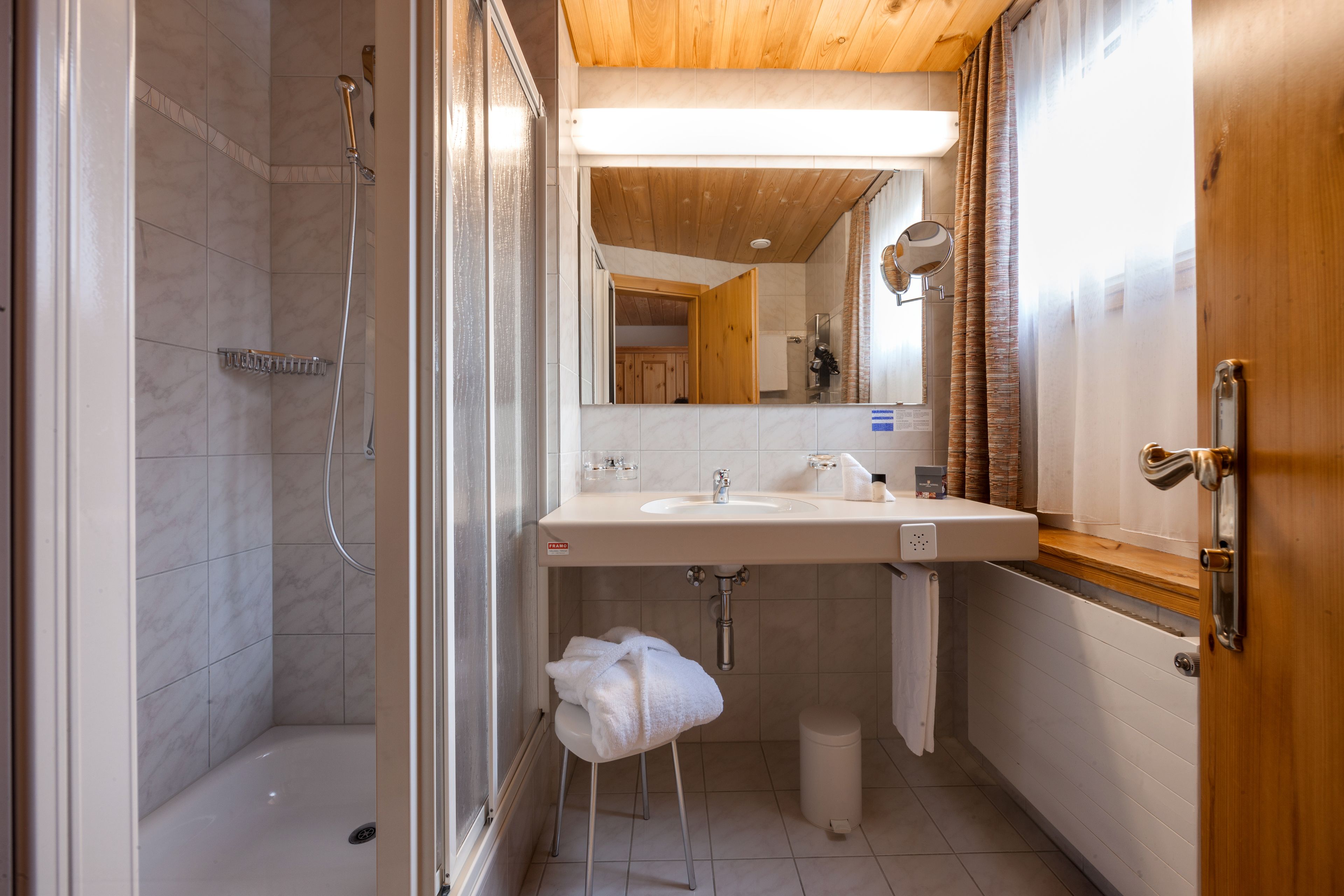 single room | bathroom | hair dryer, bathrobes, slippers, towels