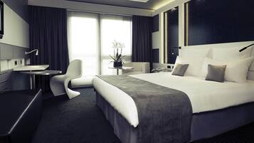 Hypo-allergenic bedding, minibar, in-room safe, desk