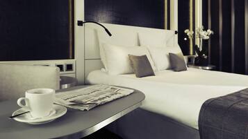 Literie hypoallergénique, minibar, coffres-forts dans les chambres