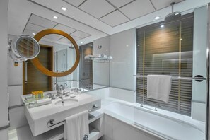 Deluxe Room | Bathroom | Combined shower/tub, deep soaking tub, rainfall showerhead