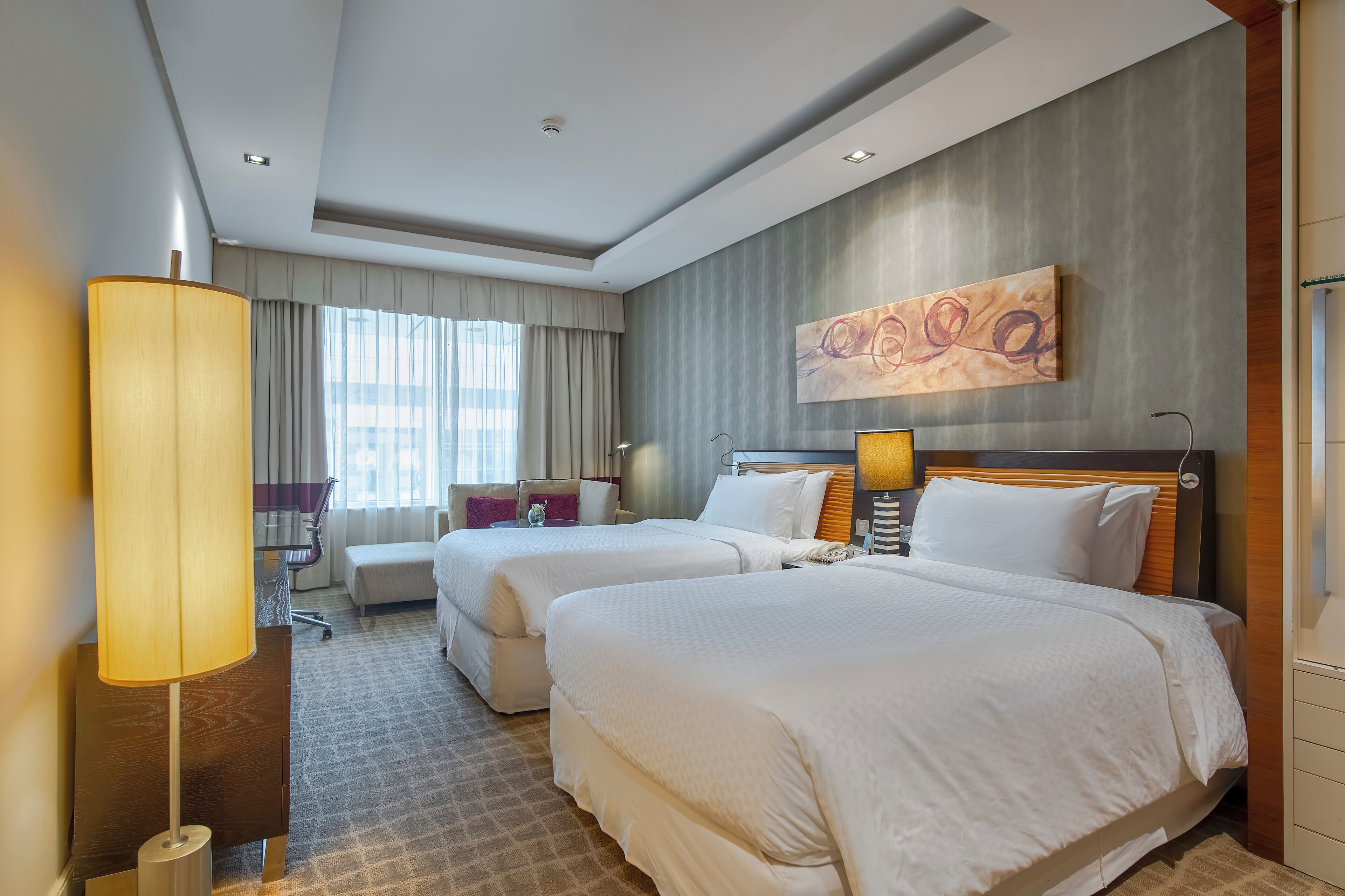 deluxe room | premium bedding, minibar, in-room safe, desk