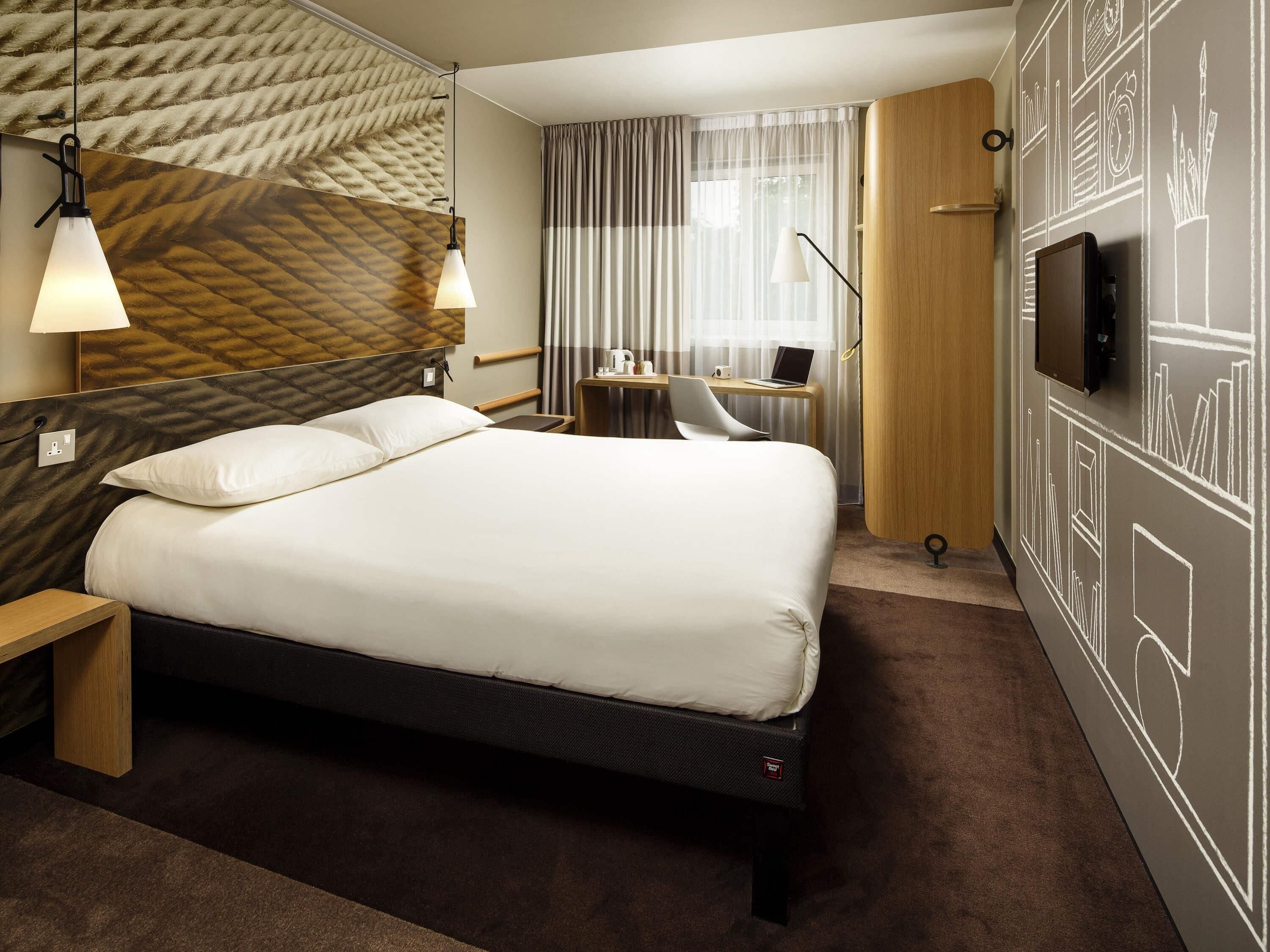Memory foam beds, desk, laptop workspace, blackout drapes
