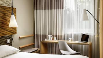 Memory-foam beds, desk, laptop workspace, blackout curtains