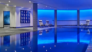 Indoor pool, open 6:00 AM to 10:00 PM, pool loungers