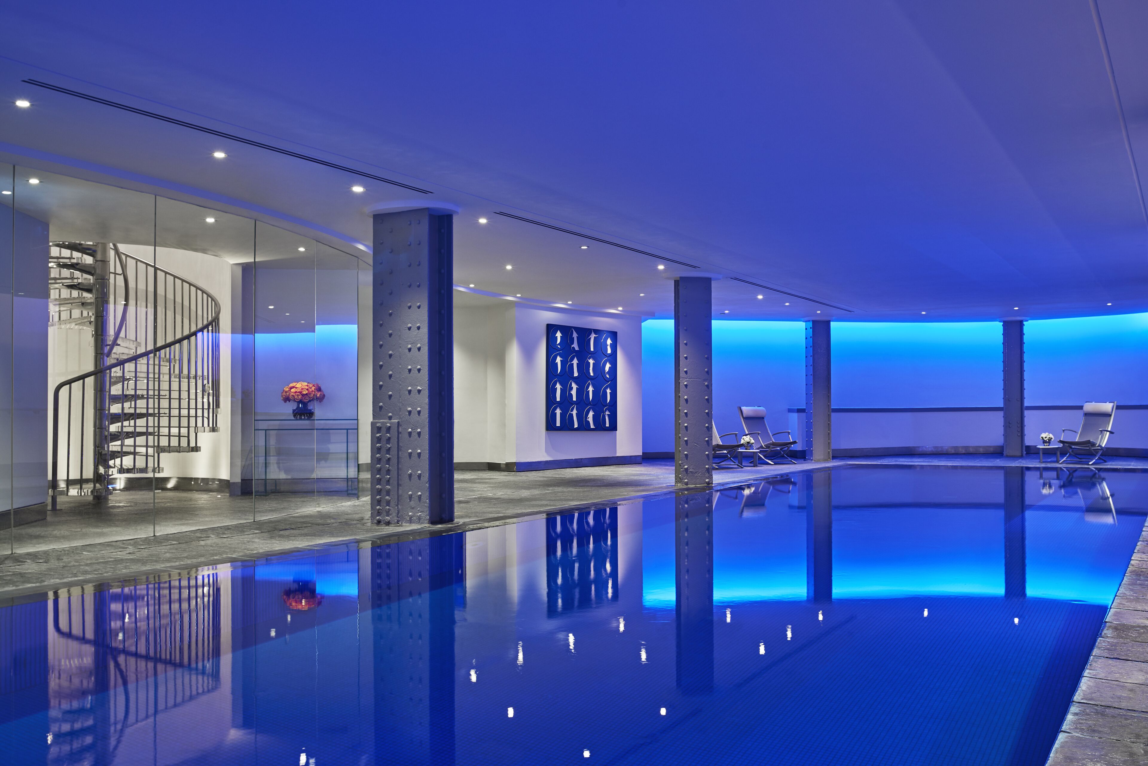 Indoor pool, open 6:00 AM to 10:00 PM, pool loungers