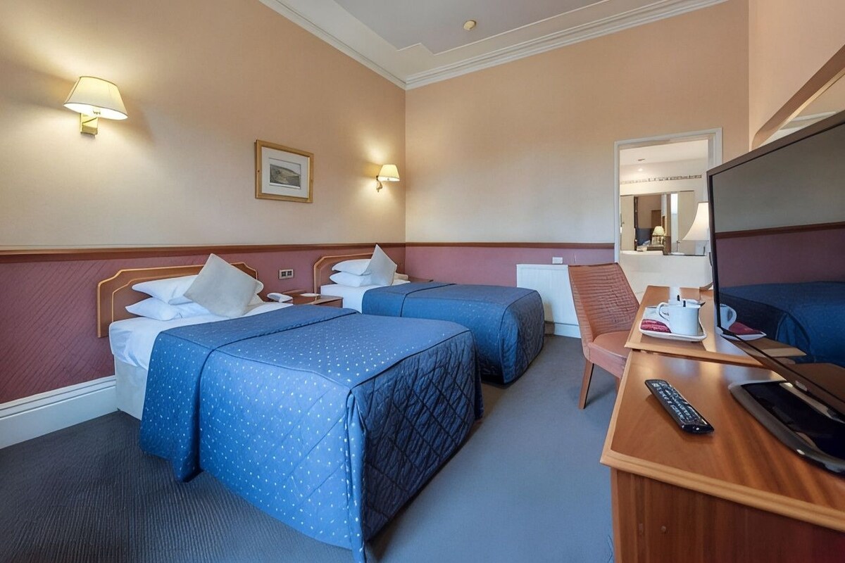Desk, iron/ironing board (on request), WiFi (free), bed sheets