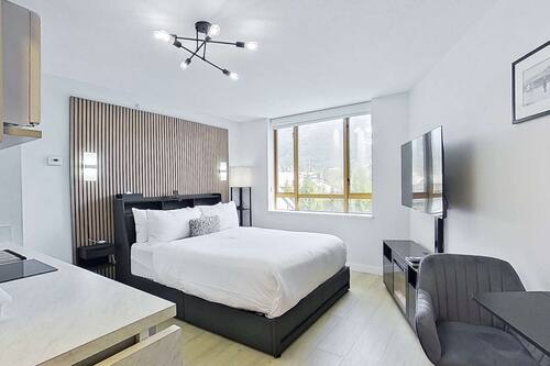 Habitación (Studio,Mountain View) | Zona de estar | Televisión de pantalla plana de 36 pulgadas con canales por cable