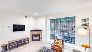 Renovated One Bedroom | Living area | 36-inch flat-screen TV with cable channels, TV - Whistler Cascade Lodge (Whistler)
