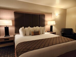 Premium bedding, desk, laptop workspace, blackout curtains