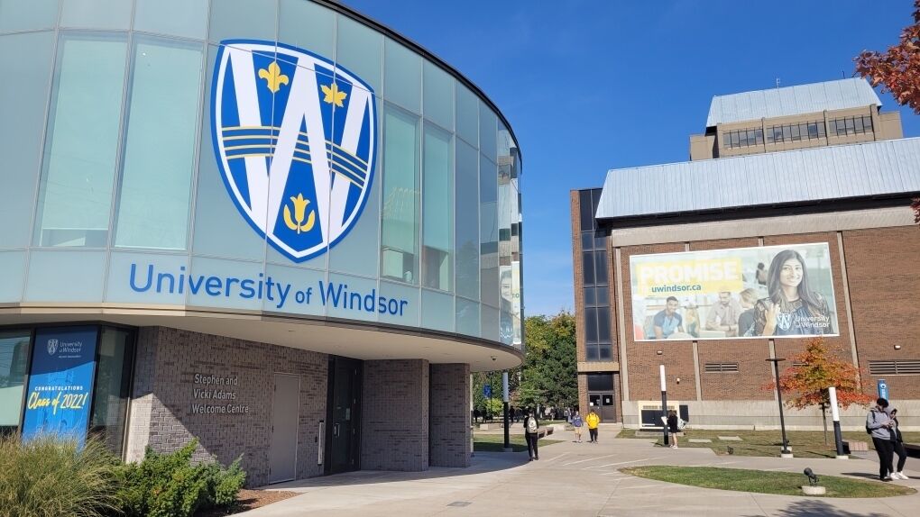 The University of Windsor building with a clear blue sky.