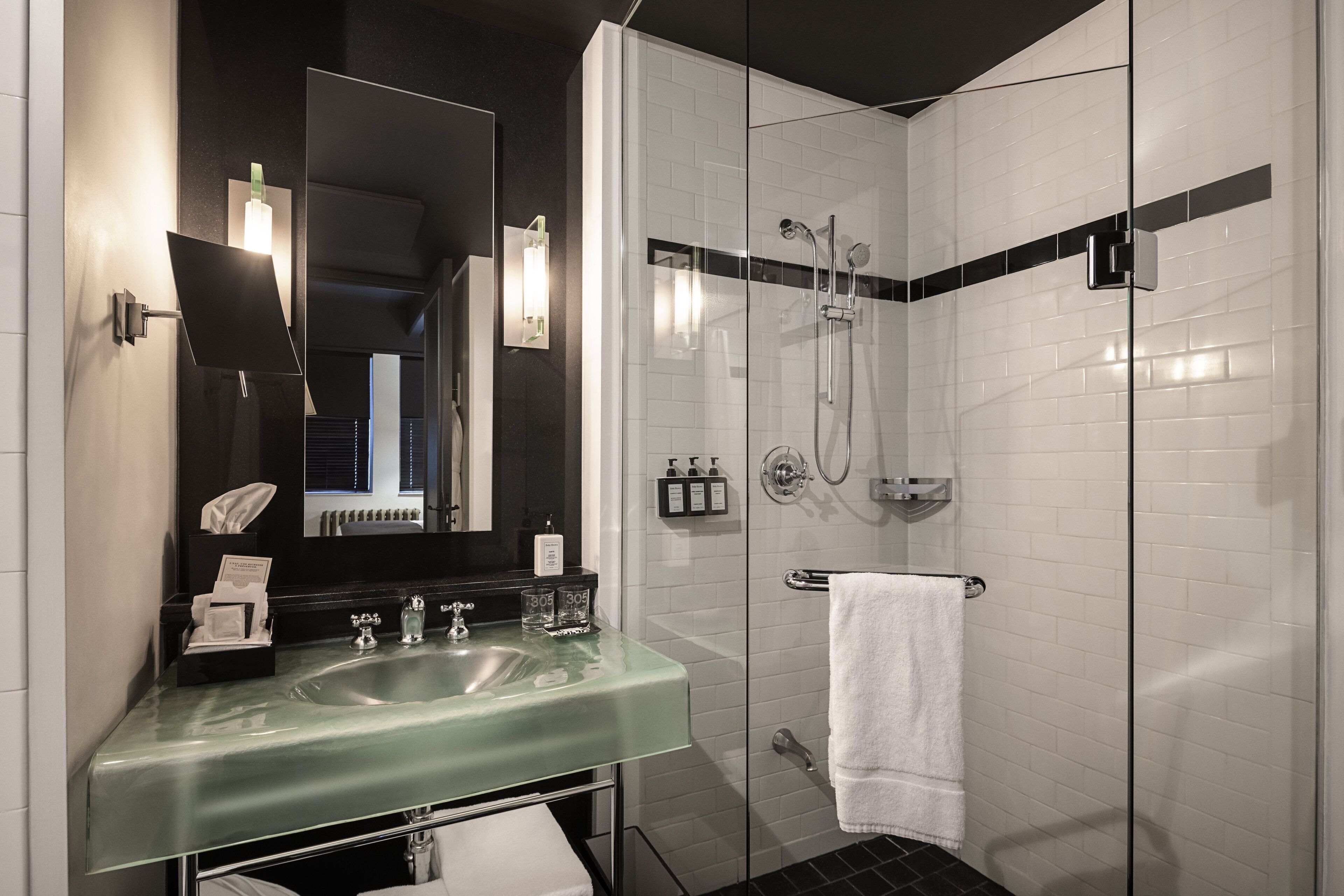 signature room, 1 king bed | bathroom | designer toiletries, hair dryer, bathrobes, towels