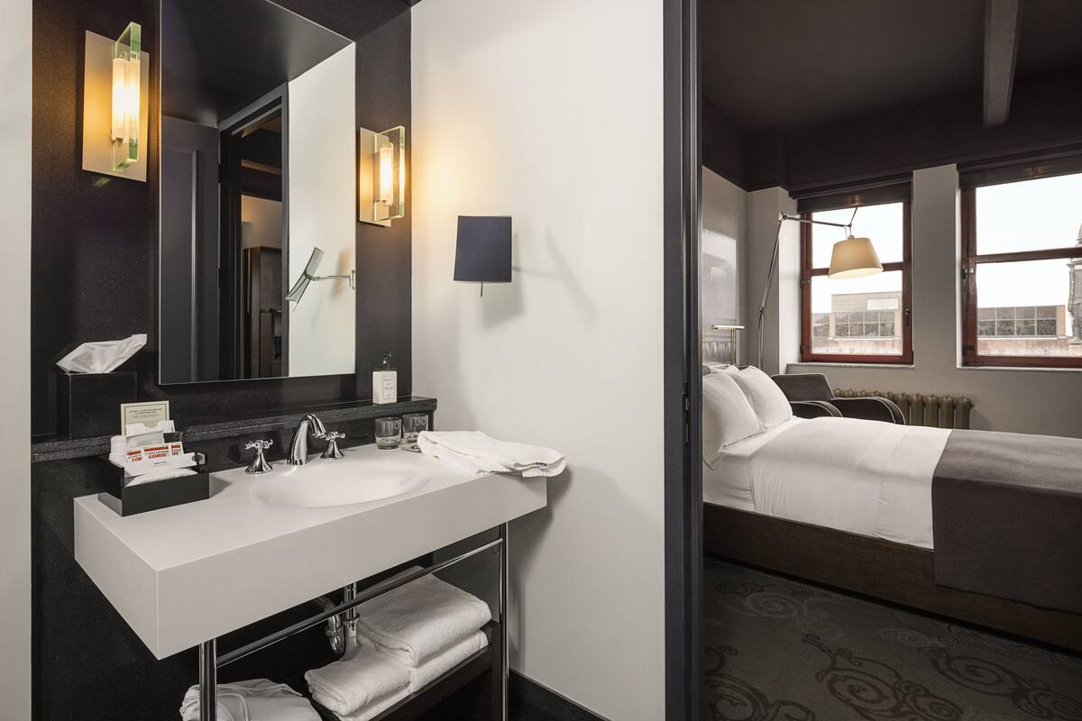 classic room, 1 king bed | bathroom | designer toiletries, hair dryer, bathrobes, towels