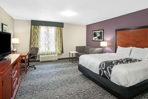 Premium bedding, desk, blackout drapes, iron/ironing board