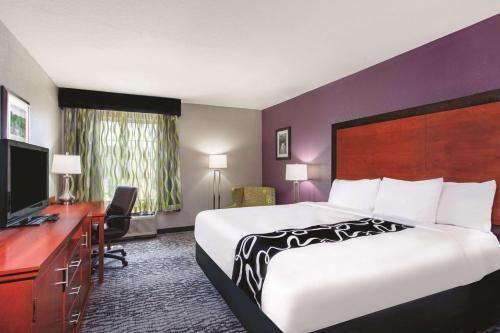 Premium bedding, desk, blackout drapes, iron/ironing board