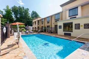 Seasonal outdoor pool, open 7:00 AM to 10:00 PM, pool umbrellas