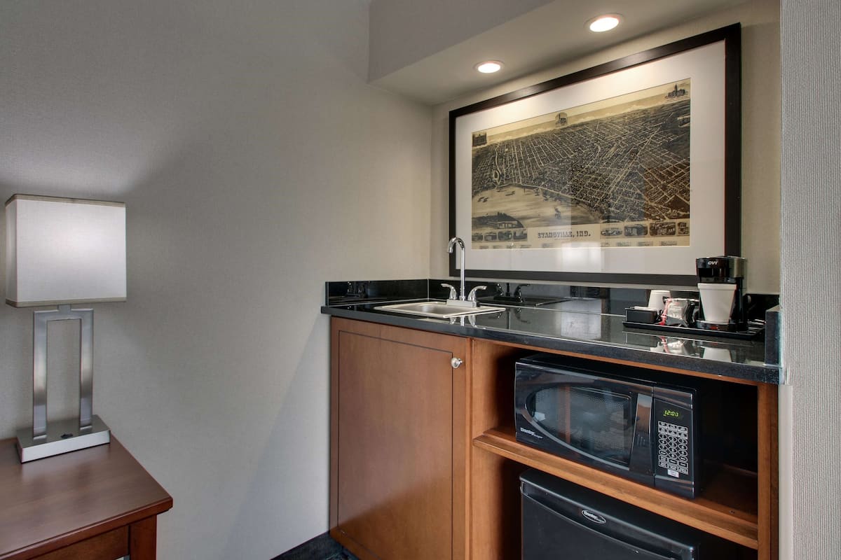 deluxe suite, 1 king bed with sofa bed, refrigerator & microwave (2 rooms, oversized, upper floor) | 1 bedroom, desk, blackout curtains, iron/ironing board