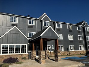Stunning multi-story building with a symmetrical facade and central entrance.