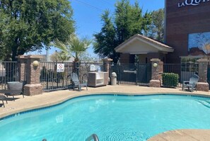Outdoor pool, open 10:00 AM to 10:00 PM, sun loungers