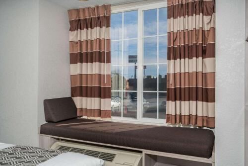 In-room safe, desk, iron/ironing board, free cribs/infant beds