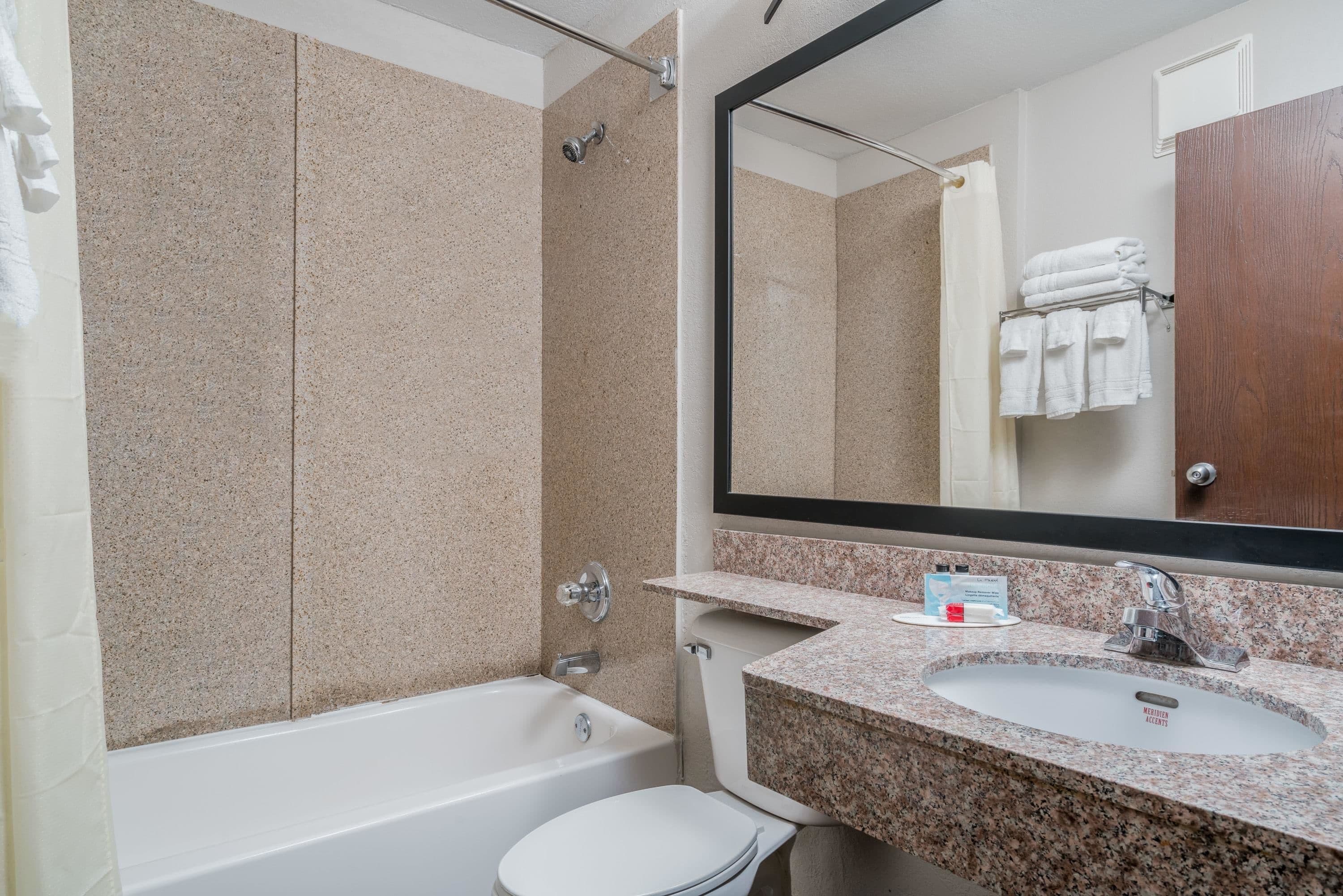 standard room, 2 queen beds | bathroom | free toiletries, hair dryer, towels, soap