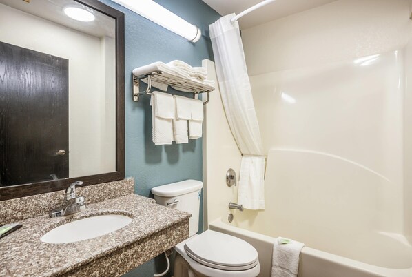 A bathroom with a sink, toilet, and bathtub. - Sleep Inn & Suites Tallahassee-Capitol (Tallahassee)