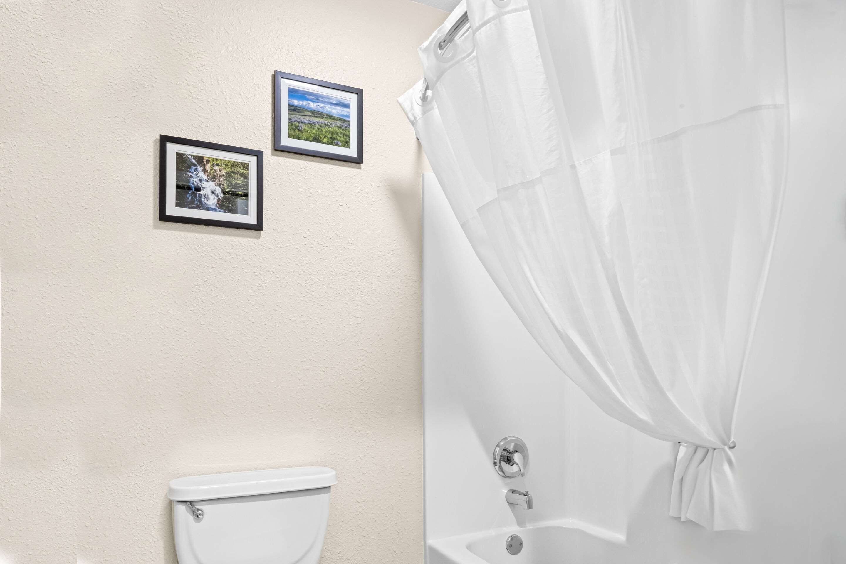 double room, 2 queen beds, non smoking | blackout curtains, iron/ironing board, free cots/infant beds, free wifi