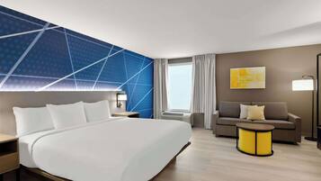 Suite, 1 King Bed with Sofa bed, Non Smoking | Desk, laptop workspace, blackout curtains, iron/ironing board