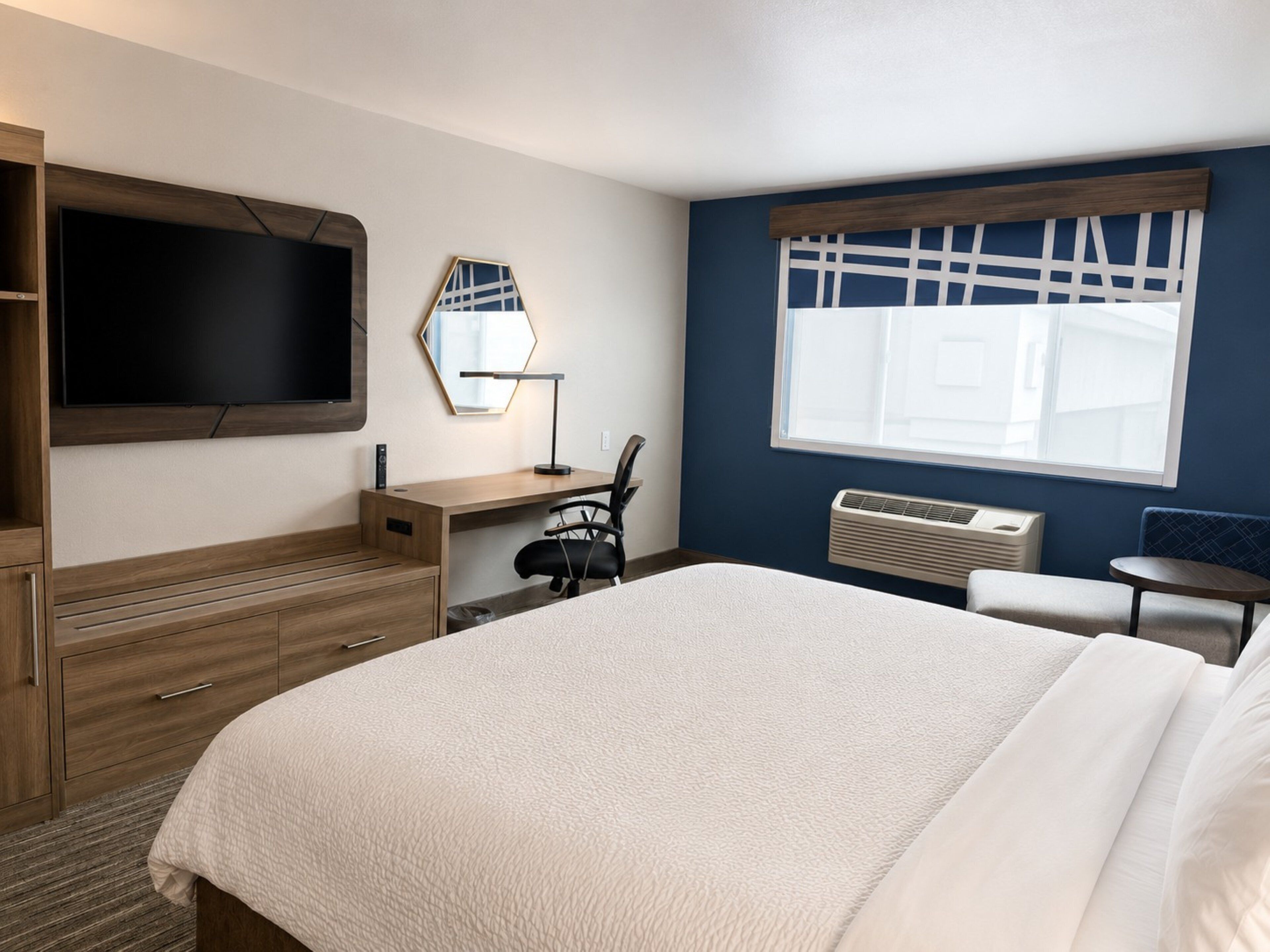 Premium bedding, pillowtop beds, desk, laptop workspace