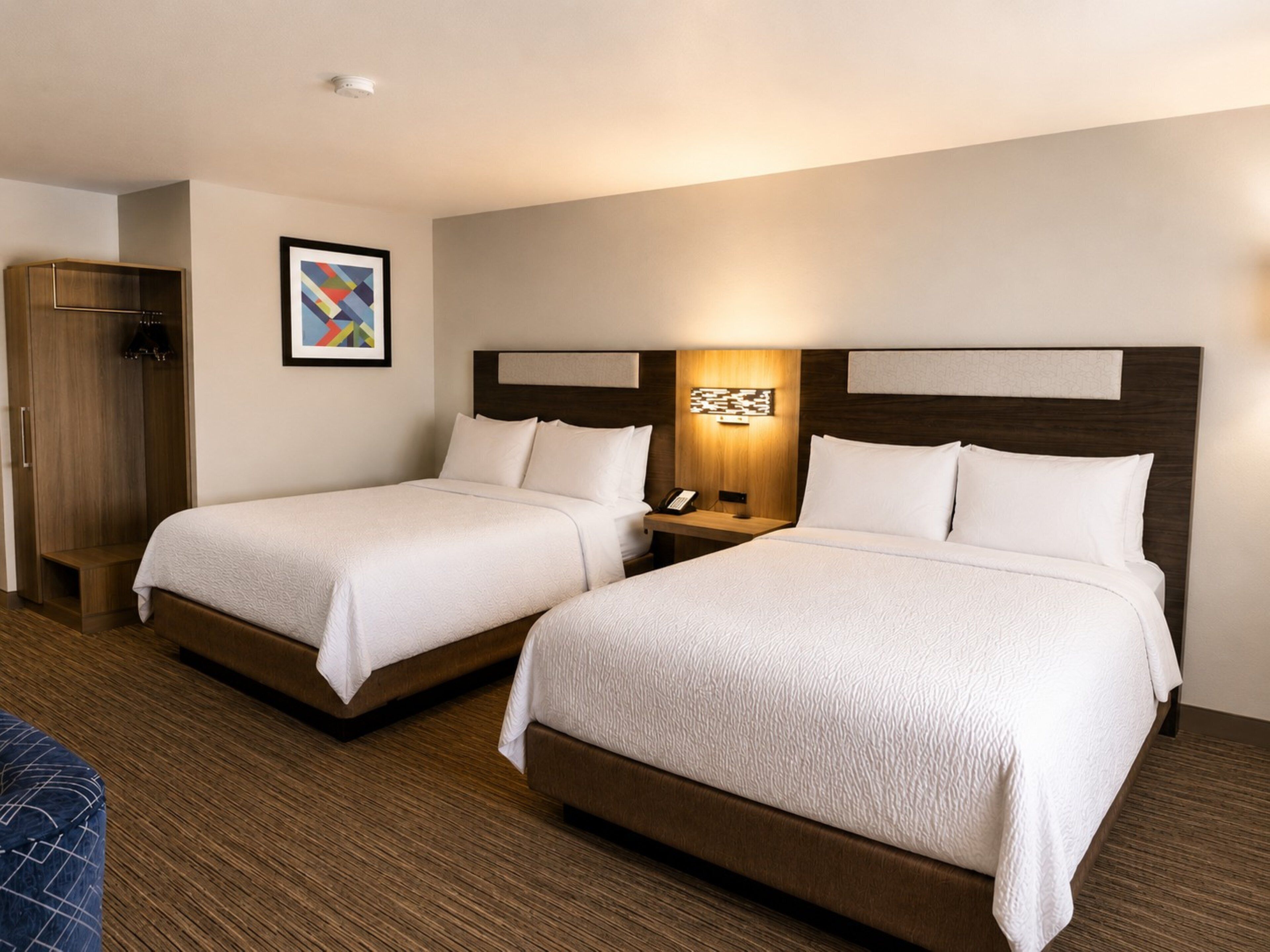 Premium bedding, pillowtop beds, desk, laptop workspace