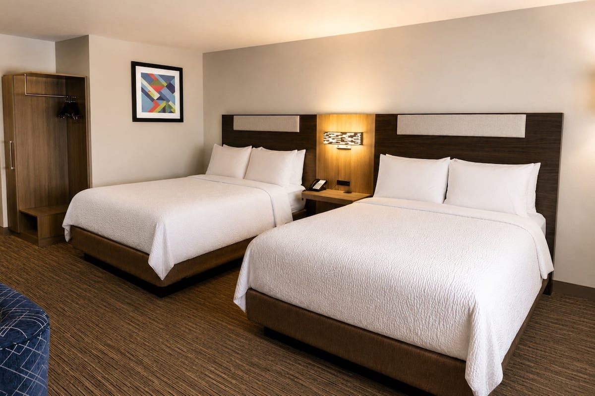 Premium bedding, pillowtop beds, desk, laptop workspace