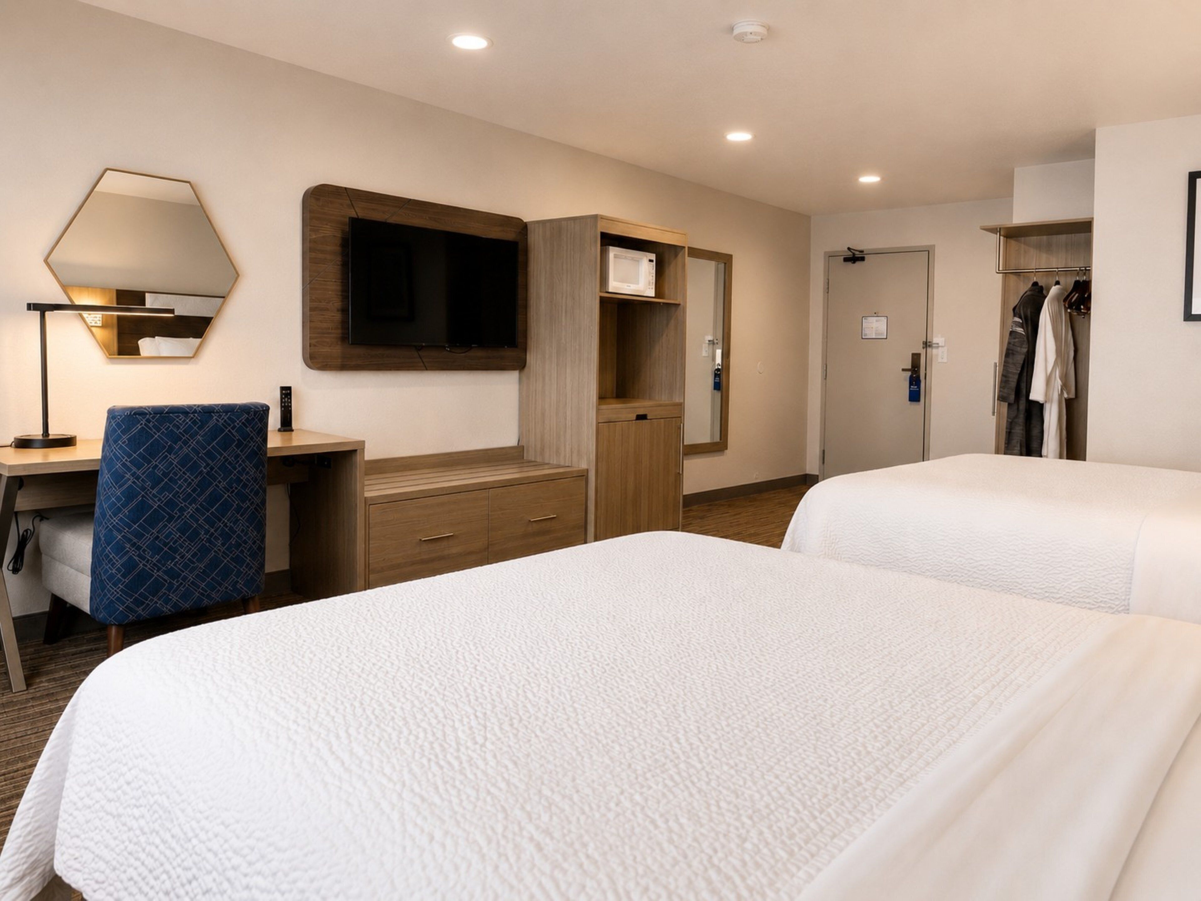 Premium bedding, pillowtop beds, desk, laptop workspace