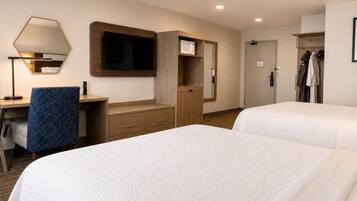 Premium bedding, pillowtop beds, desk, laptop workspace