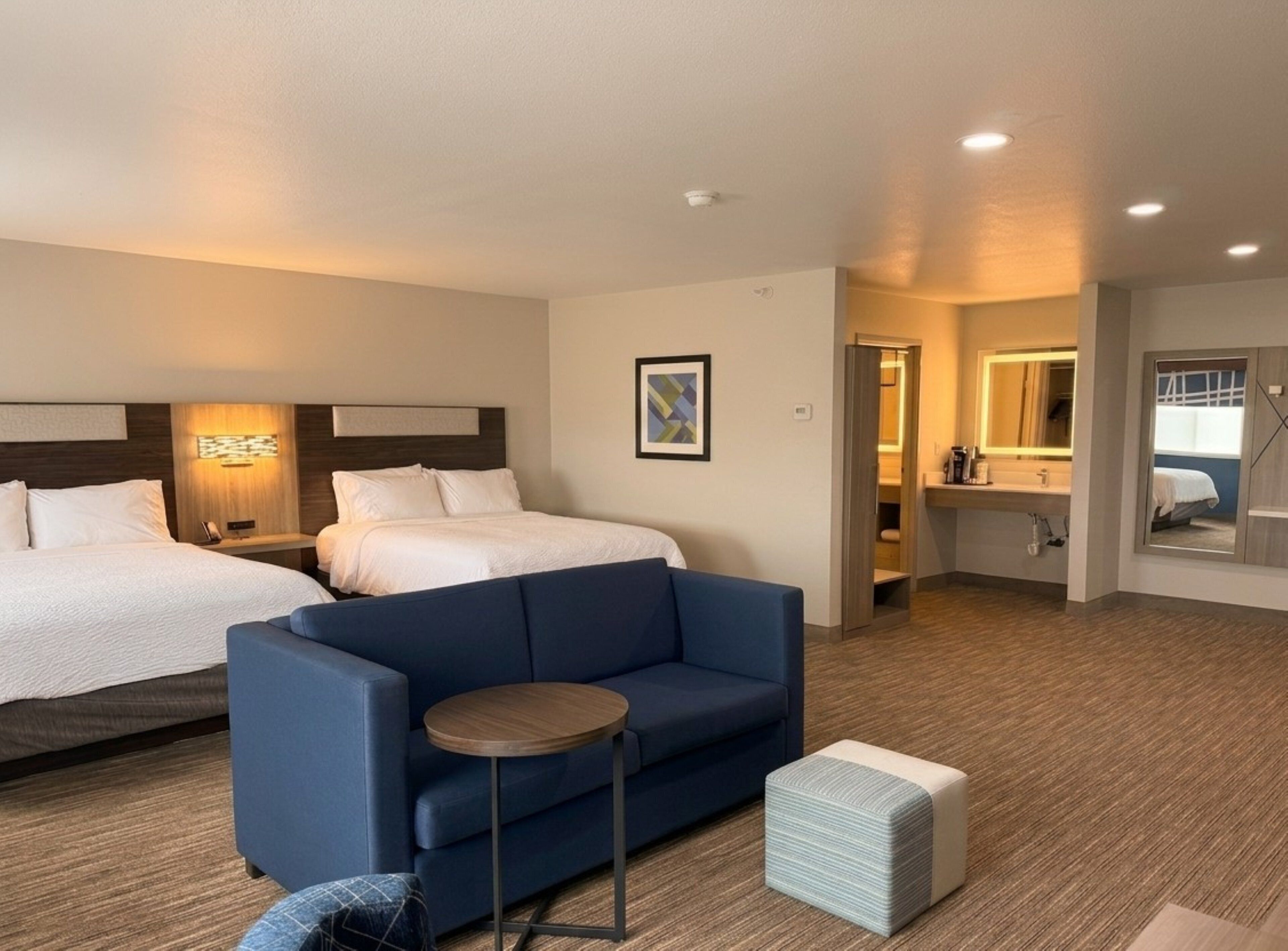 Premium bedding, pillow-top beds, desk, laptop workspace