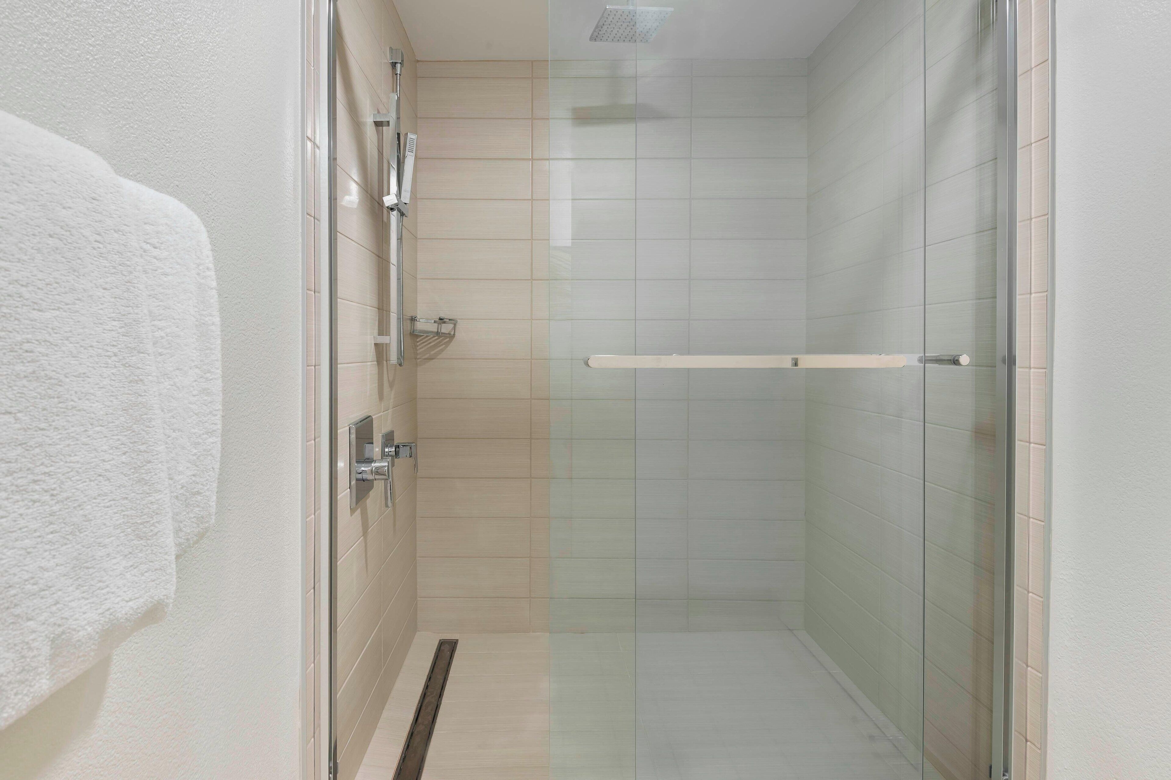 combined shower/bathtub, free toiletries, hair dryer, towels