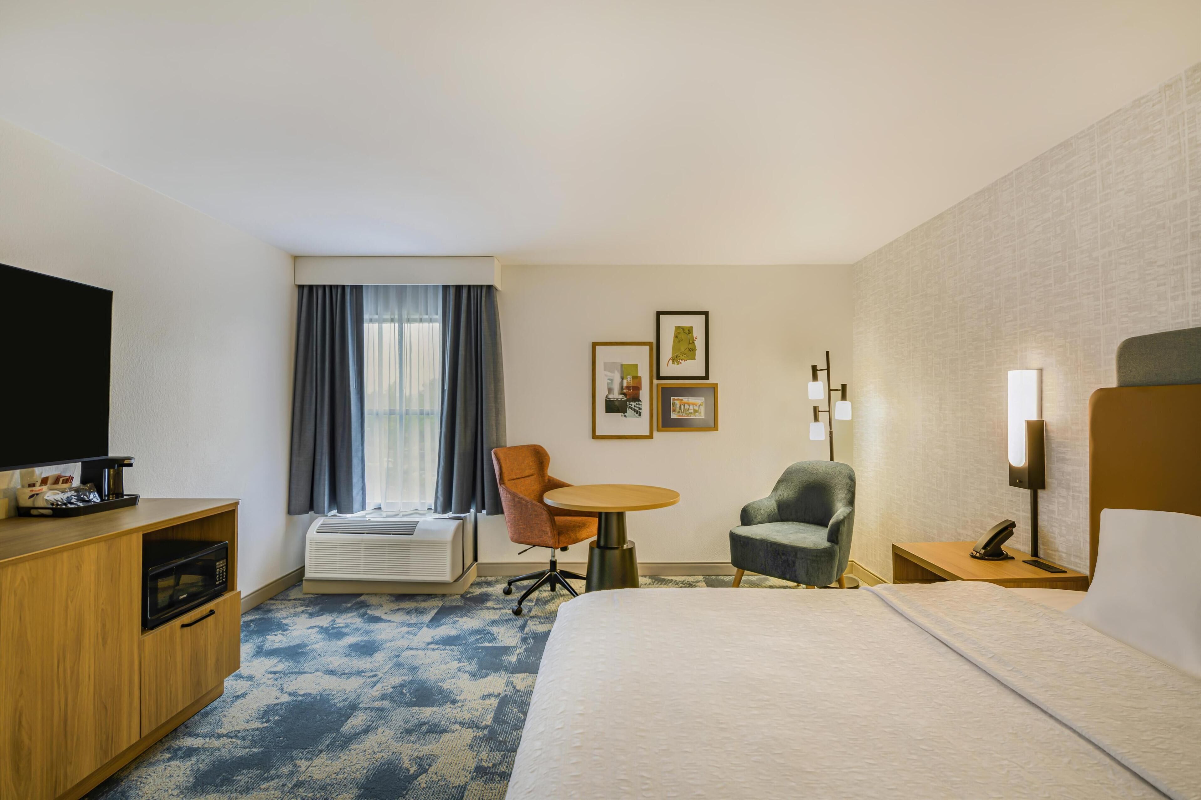 room, 1 king bed | in-room safe, desk, iron/ironing board, free wifi