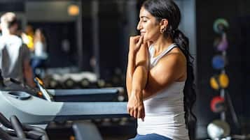 A gym with treadmills and exercise equipment.