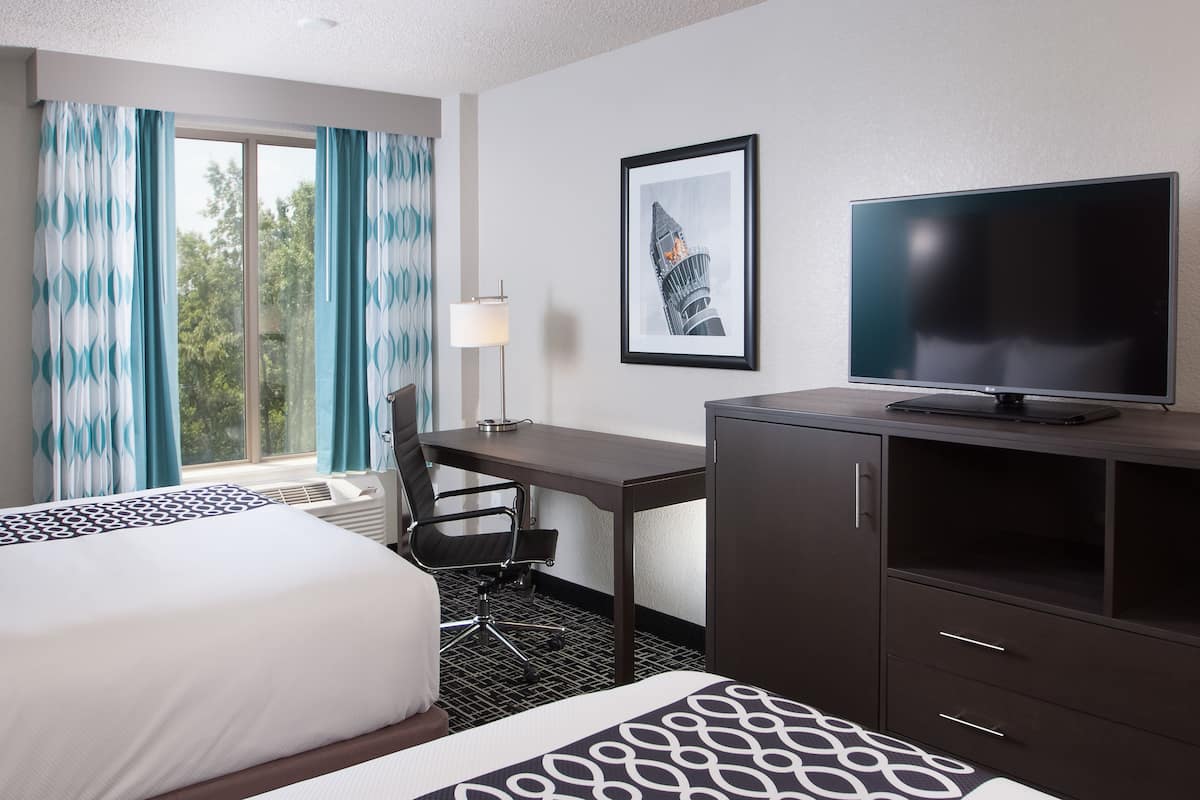 premium bedding, desk, laptop workspace, iron/ironing board