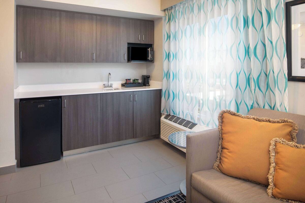 premium bedding, desk, laptop workspace, iron/ironing board