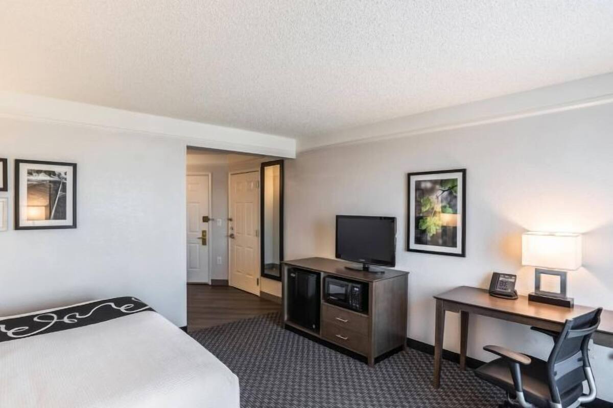 Premium bedding, desk, blackout curtains, iron/ironing board