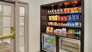 A vending machine area with snacks and drinks.